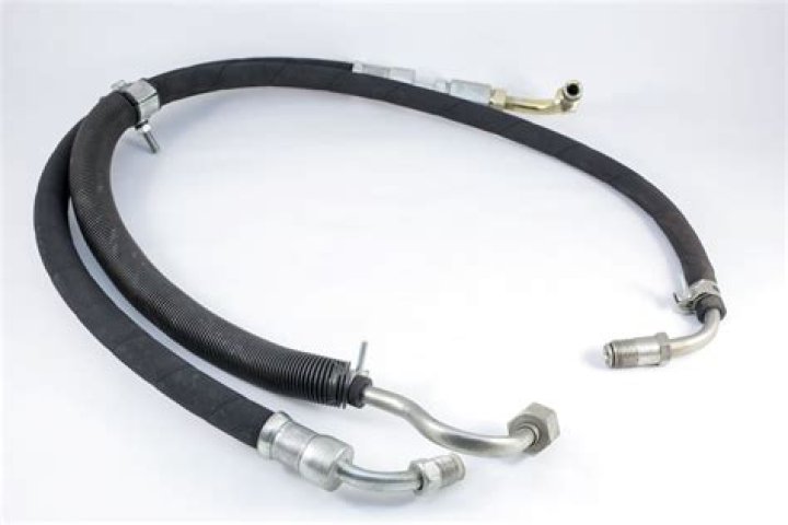 What hose connects to the power steering pump?